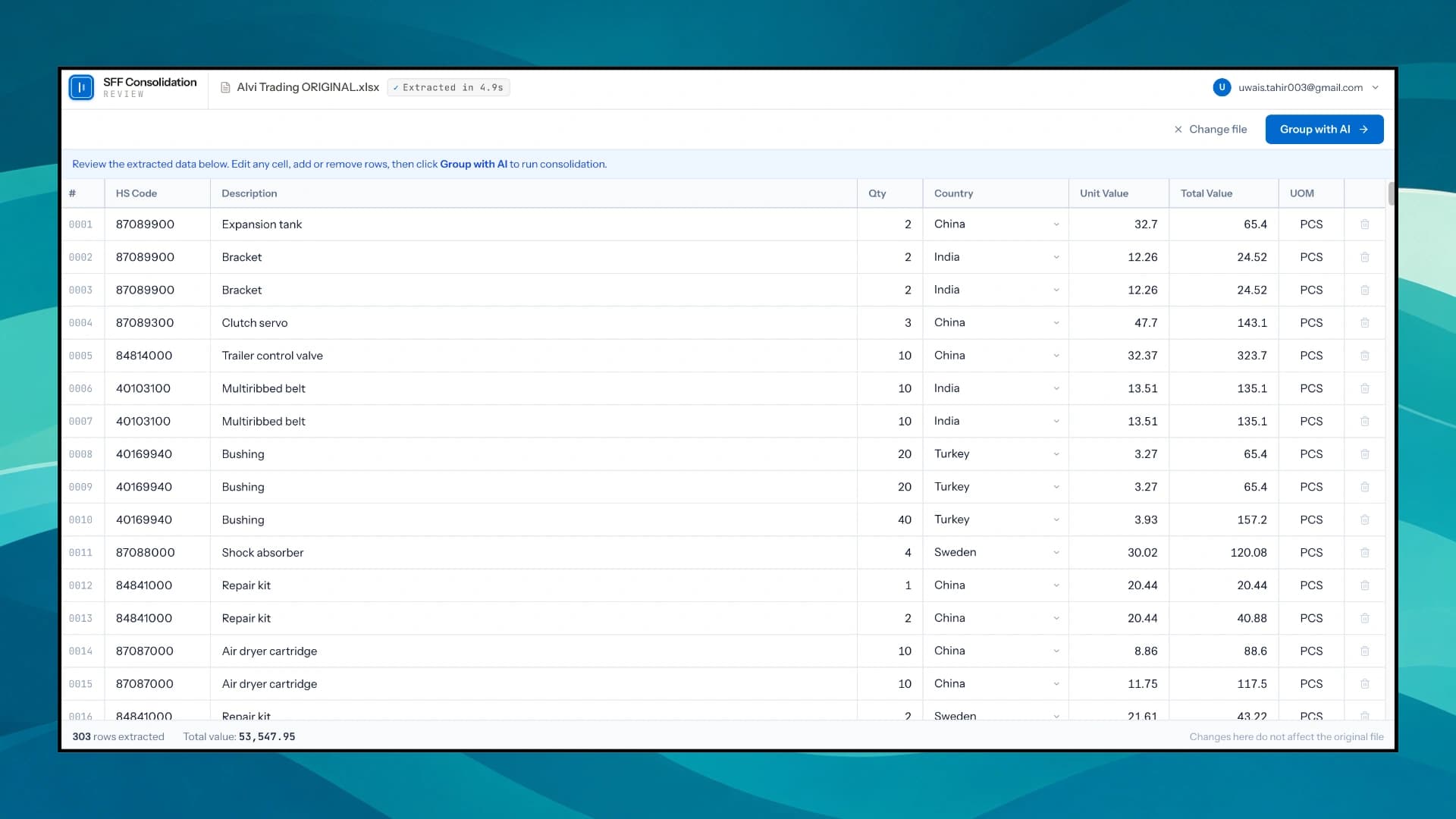 Extracted invoice line items in an editable review table before grouping